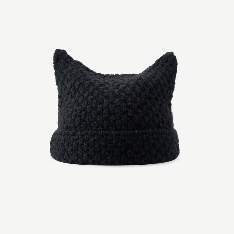 Gestreepte muts met kattenoortjes en pompons