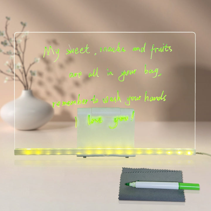 Verlicht acryl tekenbord met tekening op ledvoet