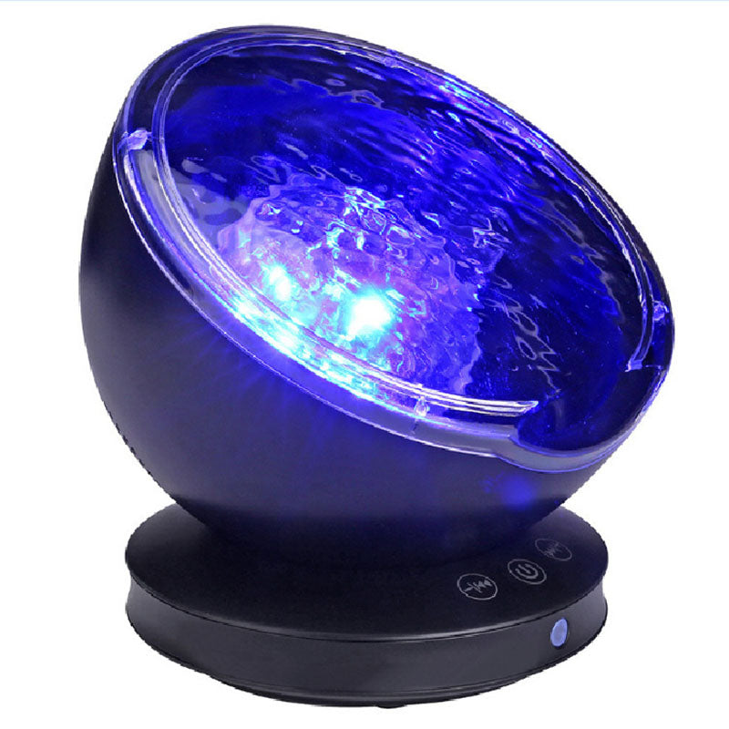 Projector met blauwe oceaangolven op plafond
