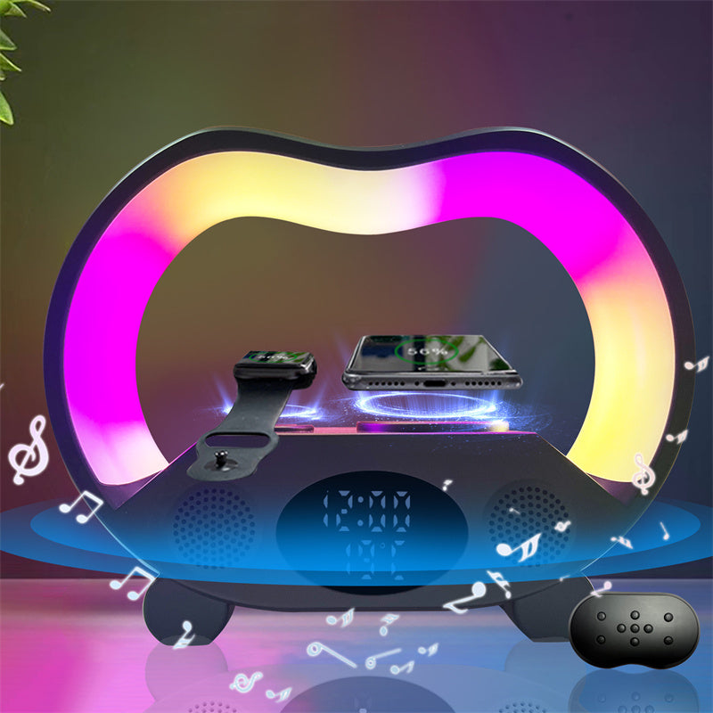 Zwarte 6-in-1 sfeerlamp met telefoon op oplader