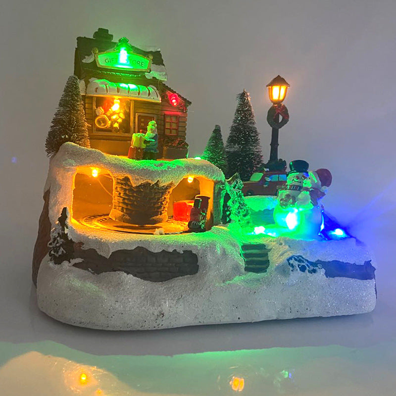 Kersthuisje met verlichting en muziek – met draaiende kerstboom