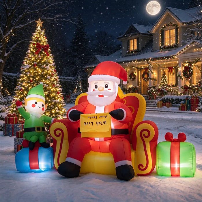 Warmtewereld Opblaasbare kerstman op bank 220 cm met elf en cadeaus