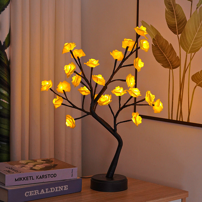 Rozenboom lamp met oplichtende roze rozen
