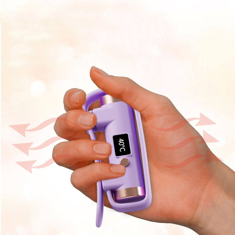 Mini handwarmer om een pols