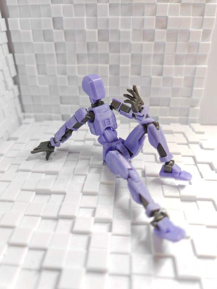 Oranje 3D-geprinte robotfiguur in actiehouding