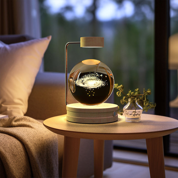 Warmtewereld Kristallen bol lampje met 3D gravure op houten voet