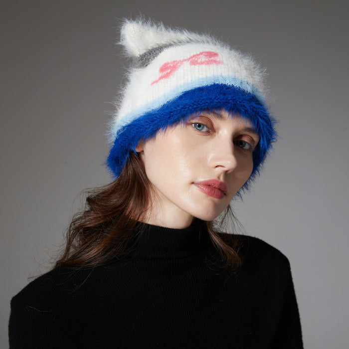 Warmtewereld Pluizige beanie met kattenoortjes en strikjespatroon