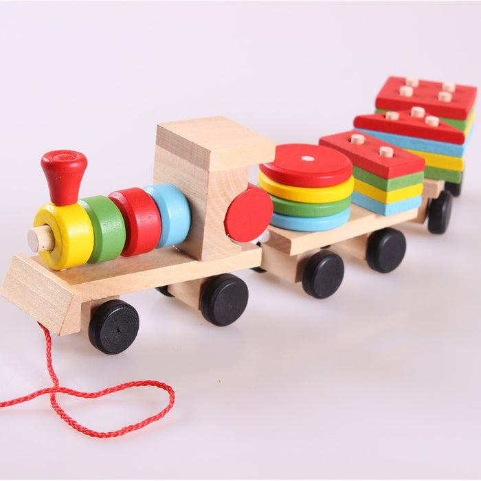 Warmtewereld Houten trein met twee wagons en 16 vormblokjes