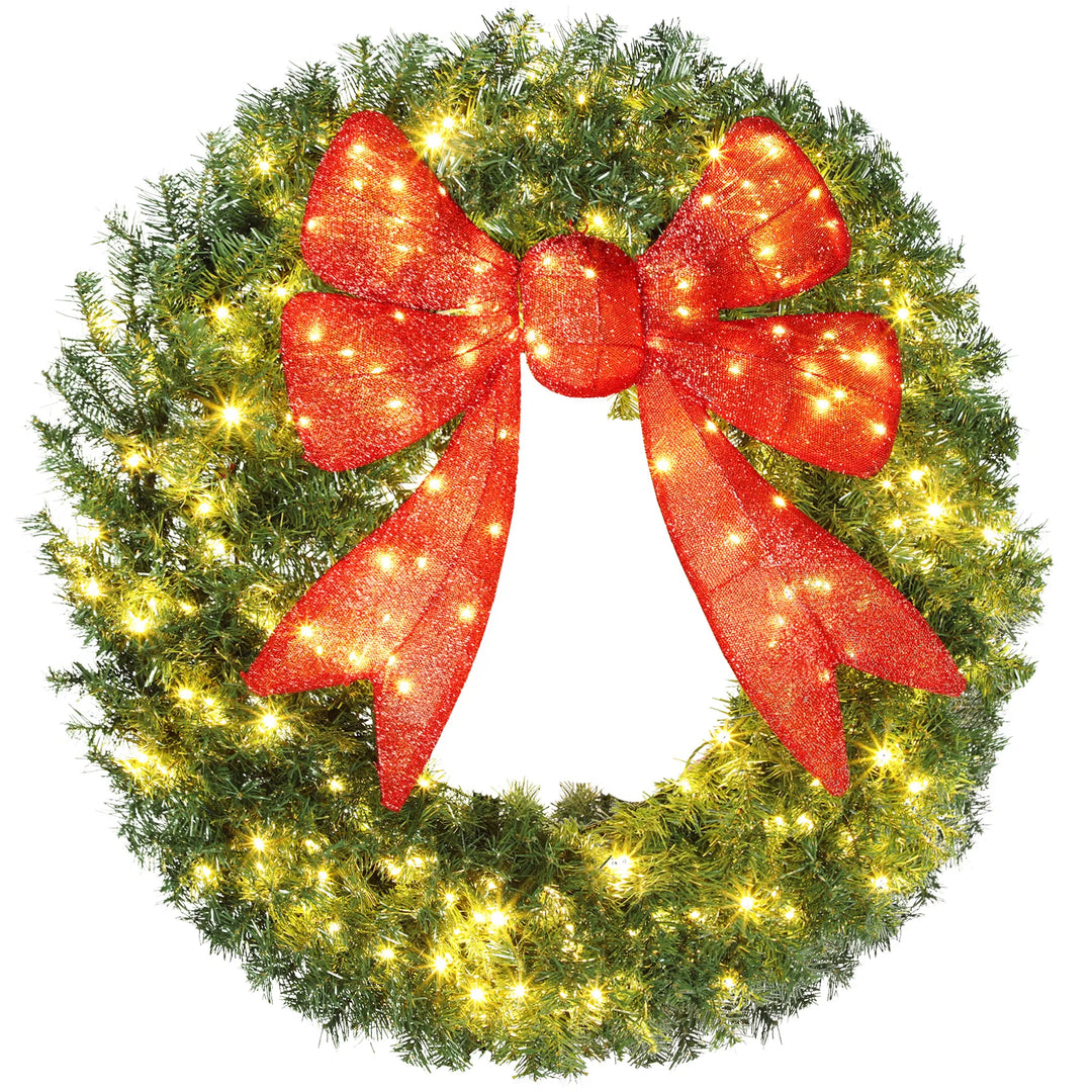 Grote verlichte kerstkrans met rode strik