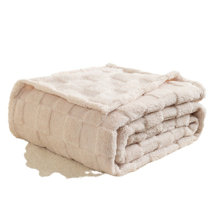 Dikke geruite pluche plaid op de bank