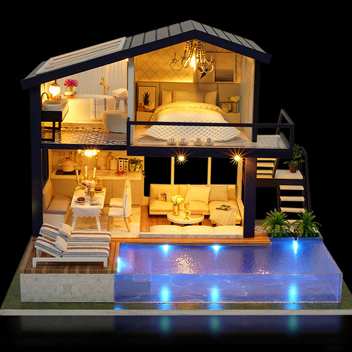 Verlicht miniatuur poppenhuis met zwembad