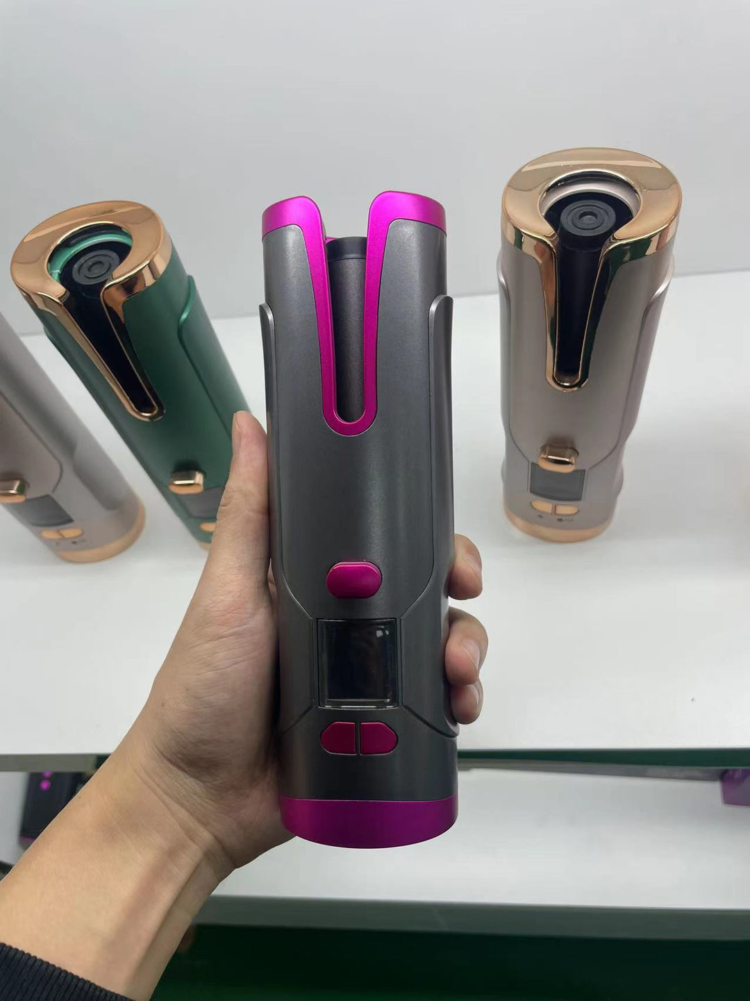 Roze draadloze krultang met lcd-scherm