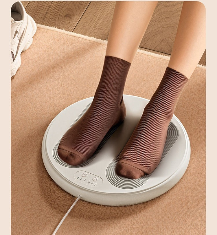 Ronde voetenwarmer met voeten erop