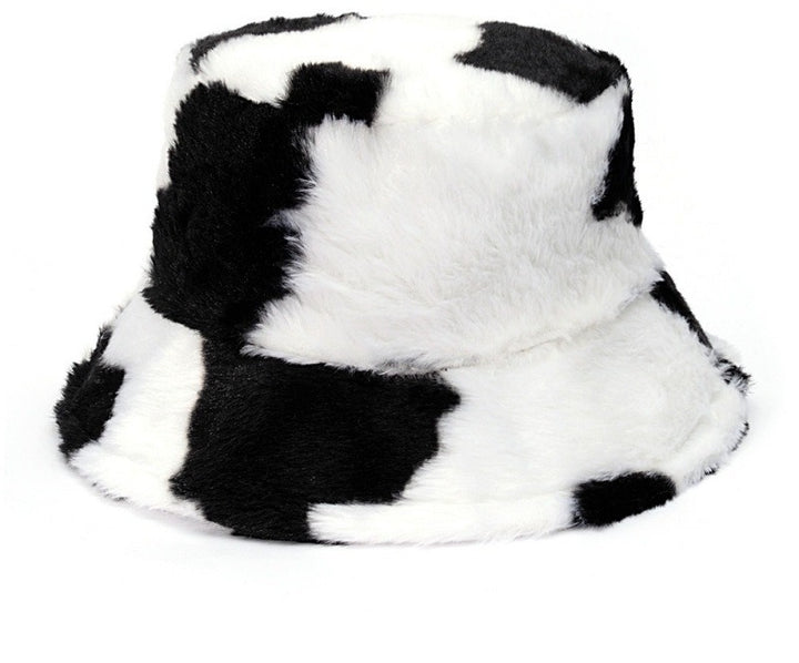 Pluizige bucket hat met koeienprint