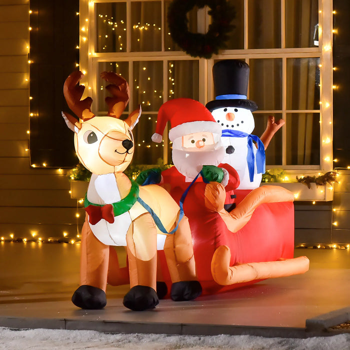 Warmtewereld Opblaasbare kerstman met rendier en sneeuwpop op een slee