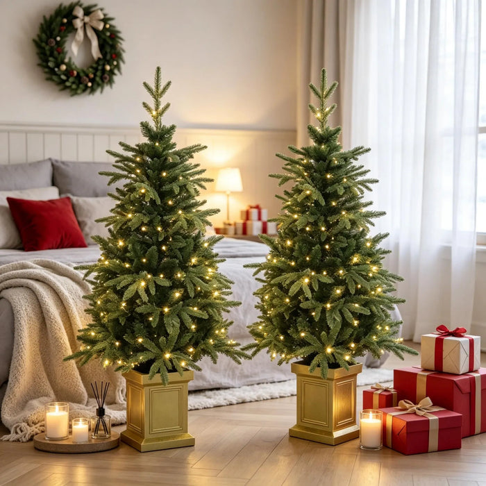 Warmtewereld Set van 2 kerstboompjes 122 cm in gouden pot op batterijen