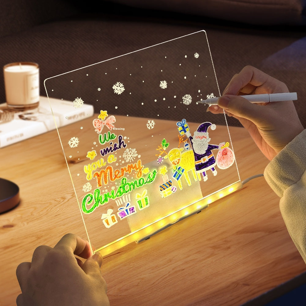 Verlicht acryl tekenbord met tekening op ledvoet