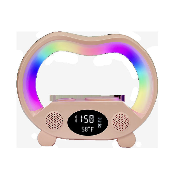 Zwarte 6-in-1 sfeerlamp met telefoon op oplader