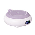Roze mokwarmer met telefoon op laadvlak