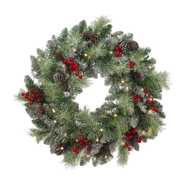 Verlichte kerstkrans met dennenappels en bessen