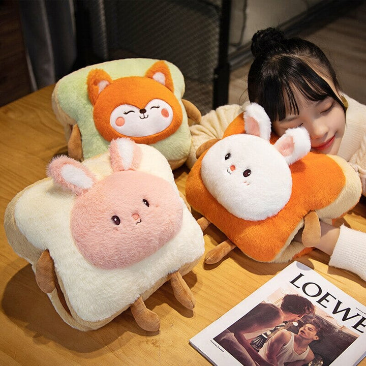 Warmtewereld™ Zachte pluche handwarmer als toast met schattig dier