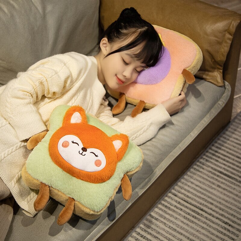 Warmtewereld™ Zachte pluche handwarmer als toast met schattig dier