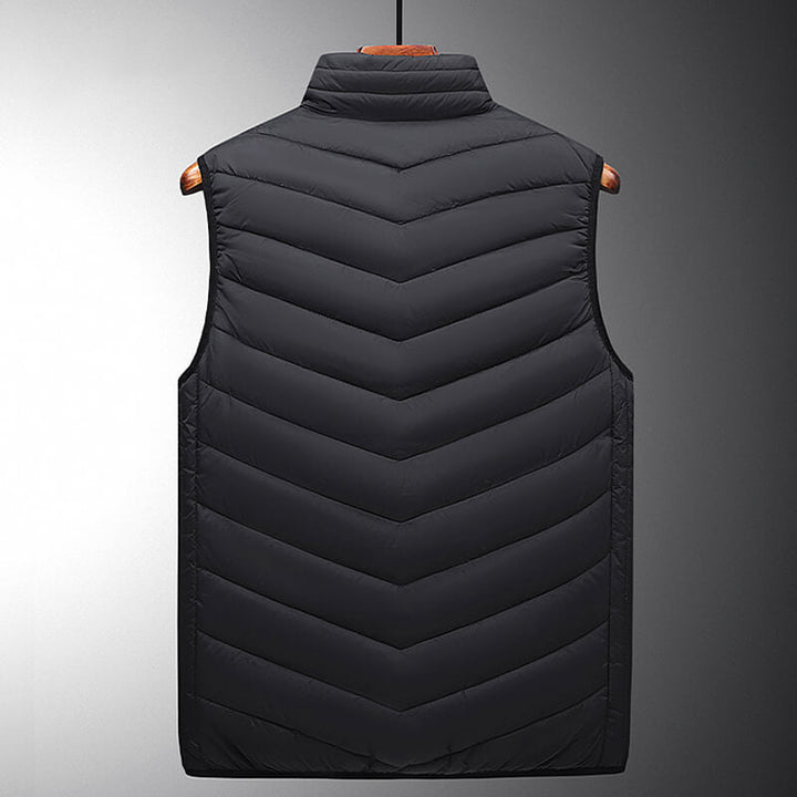 Warmtewereld™ Verwarmde bodywarmer met 13 warmtezones en carbonvezel